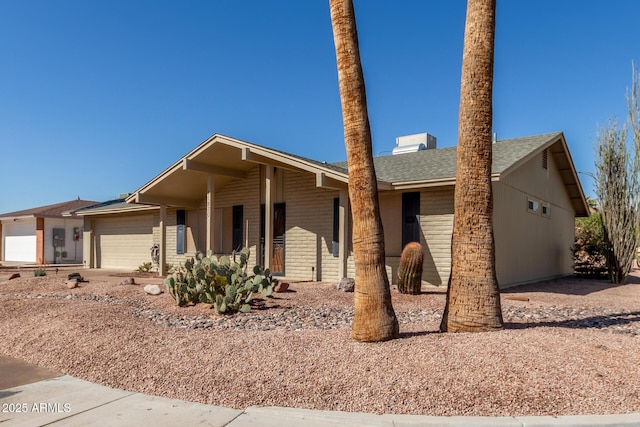 view of front of property featuring a garage