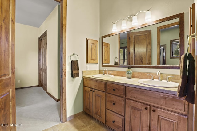 bathroom with vanity and tile patterned flooring