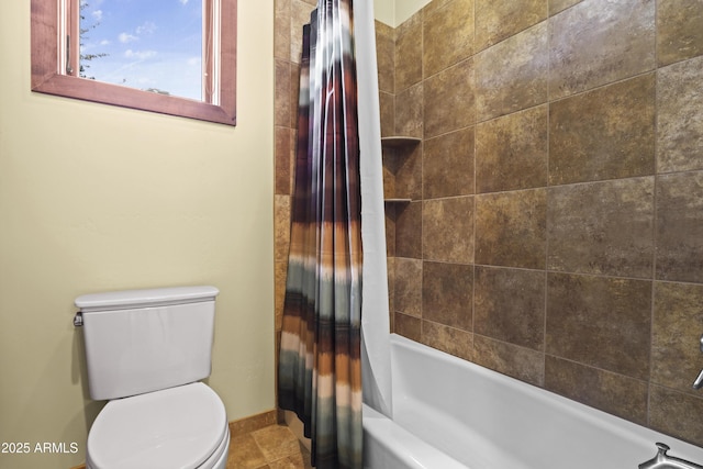 bathroom featuring shower / bathtub combination with curtain and toilet