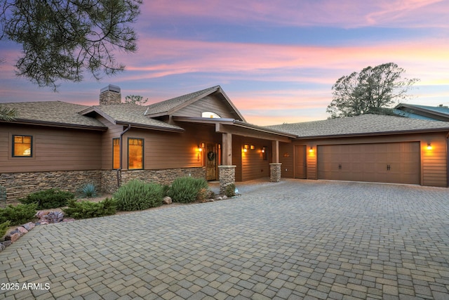 view of front of property with a garage