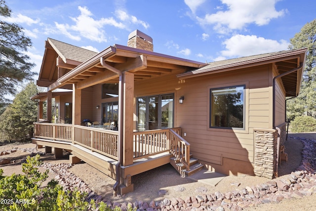 rear view of house with a deck