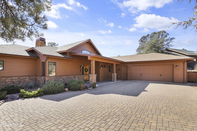 view of front of property with a garage