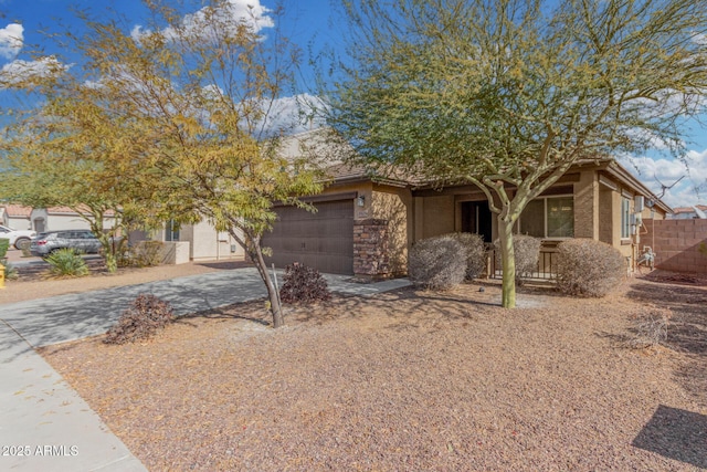 obstructed view of property with a garage