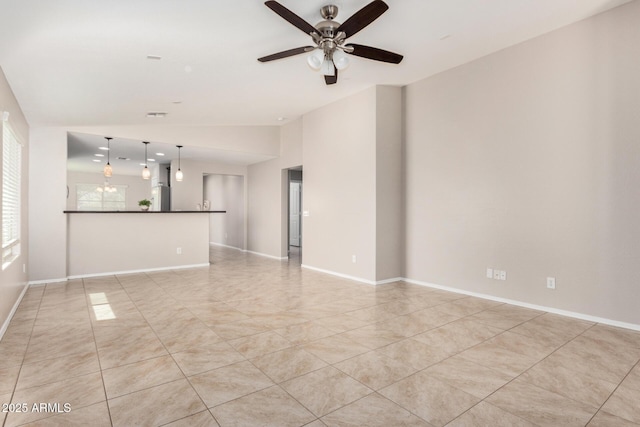 unfurnished living room with ceiling fan and lofted ceiling