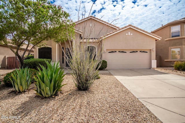 view of front of property with a garage