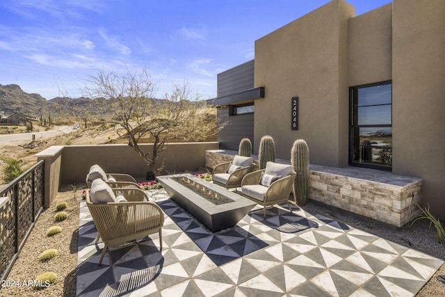 view of patio / terrace featuring a mountain view