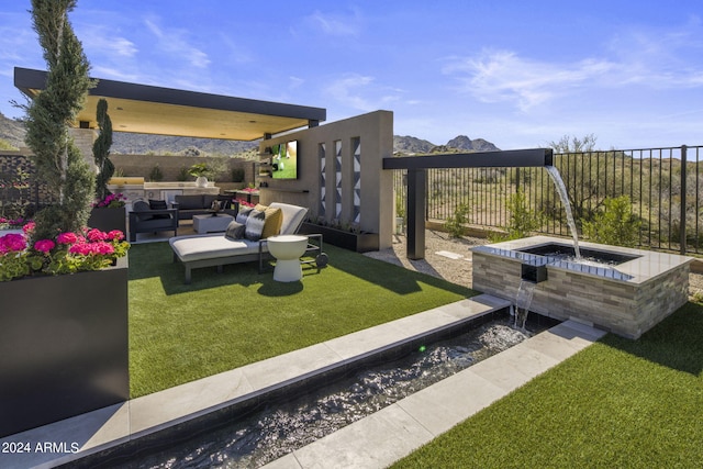 view of yard with a mountain view and an outdoor hangout area