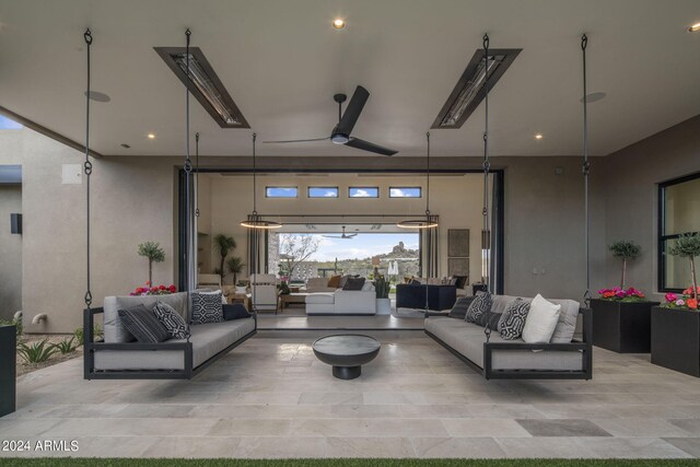 living room featuring ceiling fan