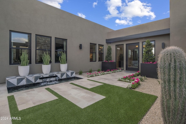 24046 N 126th Pl, Scottsdale, AZ 85255 - rear view of property with stucco siding, a patio area, and a yard
