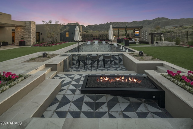 24046 N 126th Pl, Scottsdale, AZ 85255 - view of patio featuring a fire pit, an outdoor bar, and a mountain view