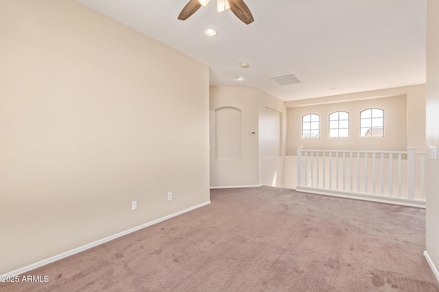 empty room featuring carpet flooring, a ceiling fan, baseboards, visible vents, and recessed lighting