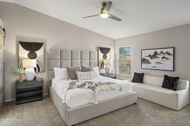 carpeted bedroom featuring lofted ceiling and ceiling fan