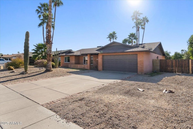 ranch-style home featuring a garage