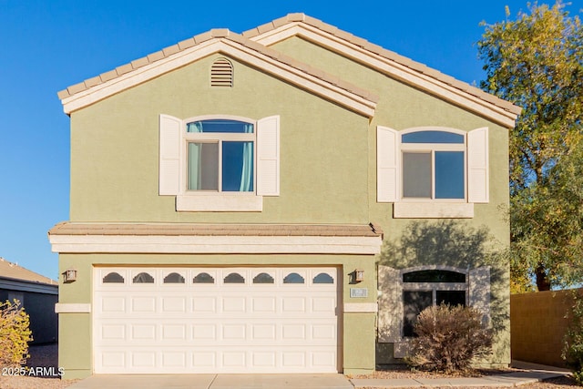 view of front of house with a garage