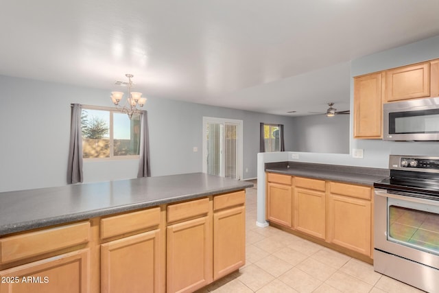 kitchen featuring ceiling fan with notable chandelier, pendant lighting, light tile patterned floors, stainless steel appliances, and light brown cabinets