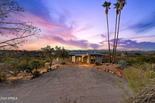 view of front of property with a mountain view