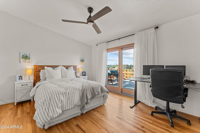 bedroom with ceiling fan, light hardwood / wood-style floors, access to exterior, and lofted ceiling