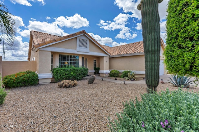 16230 E Glenpoint Dr, Fountain Hills, AZ 85268 - view of front of home featuring stucco siding, a tile roof, and fence