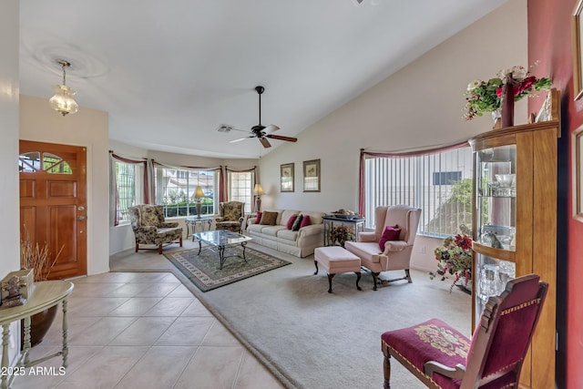 16230 E Glenpoint Dr, Fountain Hills, AZ 85268 - living room featuring light tile patterned floors, visible vents, ceiling fan, and high vaulted ceiling