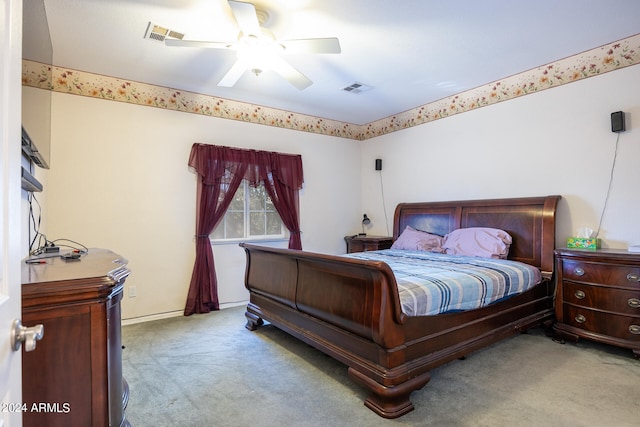 carpeted bedroom featuring ceiling fan