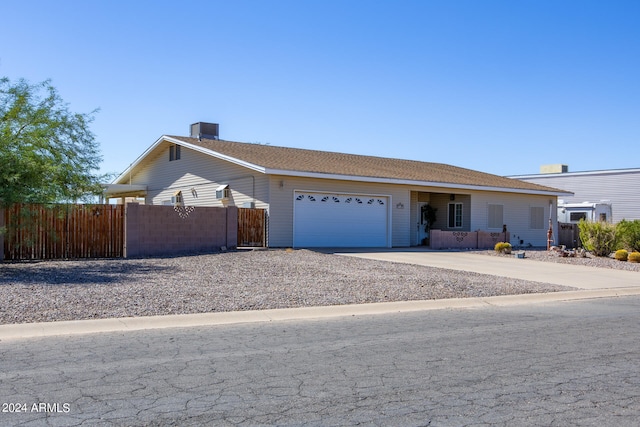 ranch-style house featuring a garage