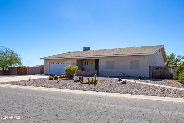 ranch-style home with a garage