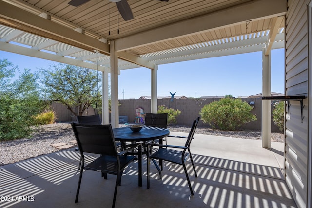 view of patio / terrace with a pergola and ceiling fan