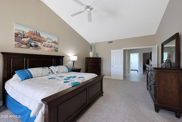 carpeted bedroom with ceiling fan and lofted ceiling