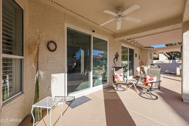 view of patio / terrace featuring ceiling fan