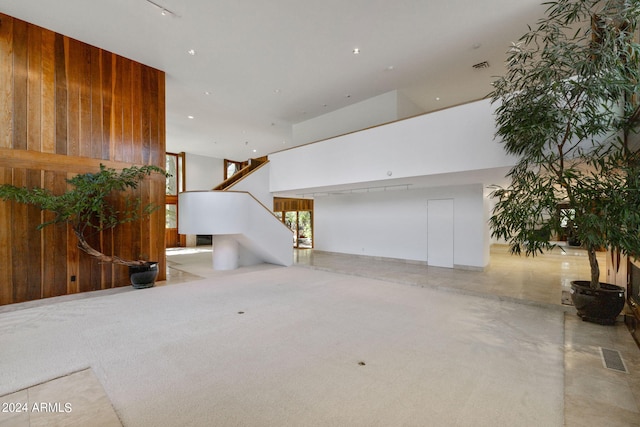 interior space featuring wood walls