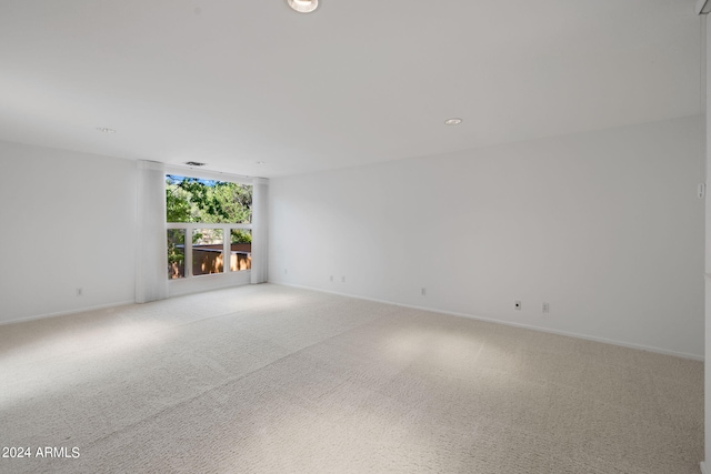 spare room featuring carpet flooring