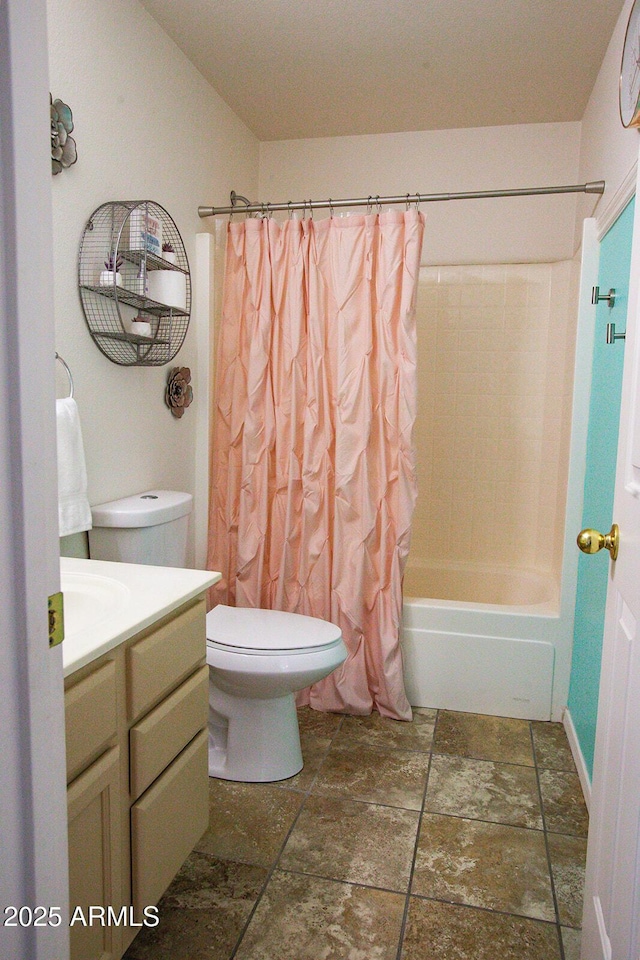 full bathroom featuring vanity, shower / bath combination with curtain, and toilet