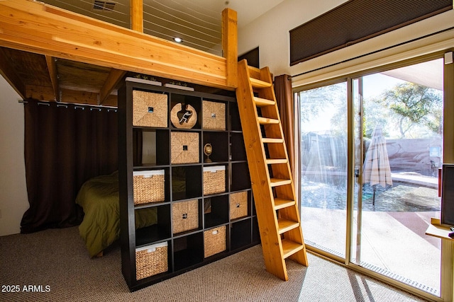 bedroom featuring carpet floors and access to outside