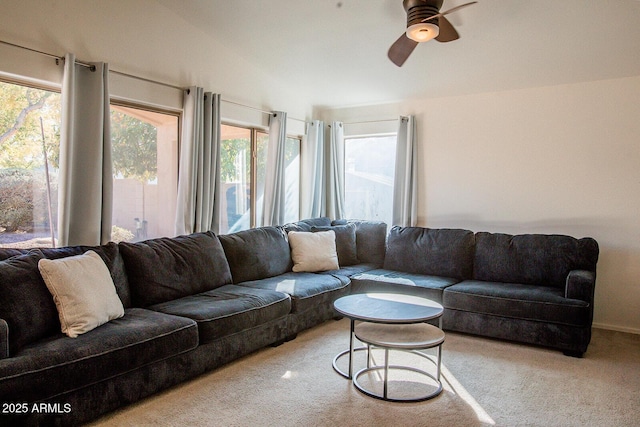 living room with carpet and ceiling fan