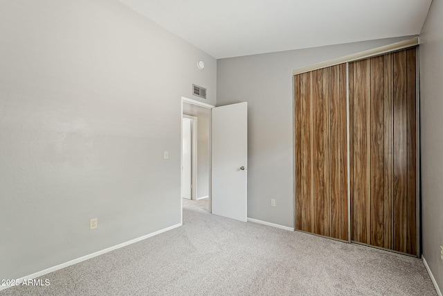 2515 S Maple Ave Unit 103, Tempe, AZ 85282 - unfurnished bedroom featuring carpet flooring, baseboards, and a closet