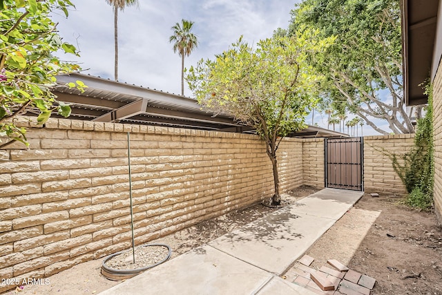2515 S Maple Ave Unit 103, Tempe, AZ 85282 - view of patio featuring a gate