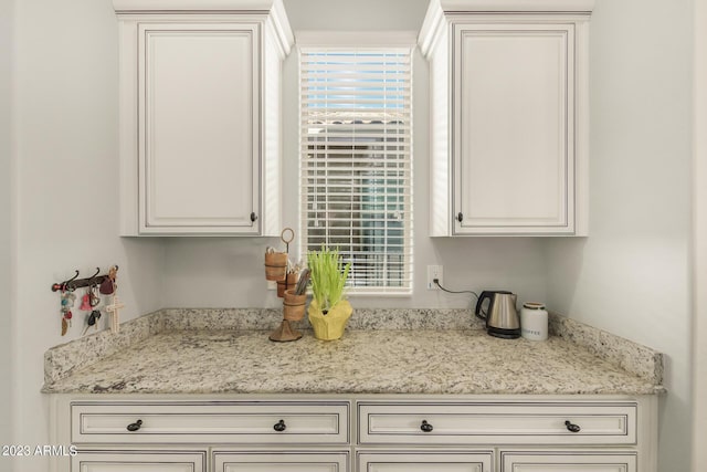5771 W Cinder Brook Way, Florence, AZ 85132 - kitchen featuring plenty of natural light