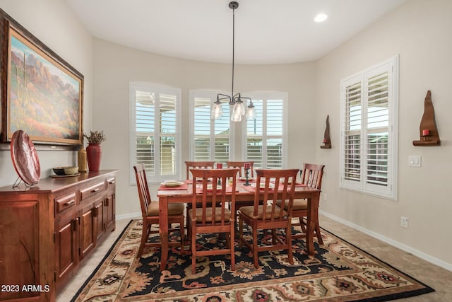 5771 W Cinder Brook Way, Florence, AZ 85132 - dining room with a chandelier and baseboards