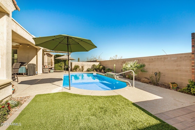 5771 W Cinder Brook Way, Florence, AZ 85132 - view of swimming pool featuring a patio area