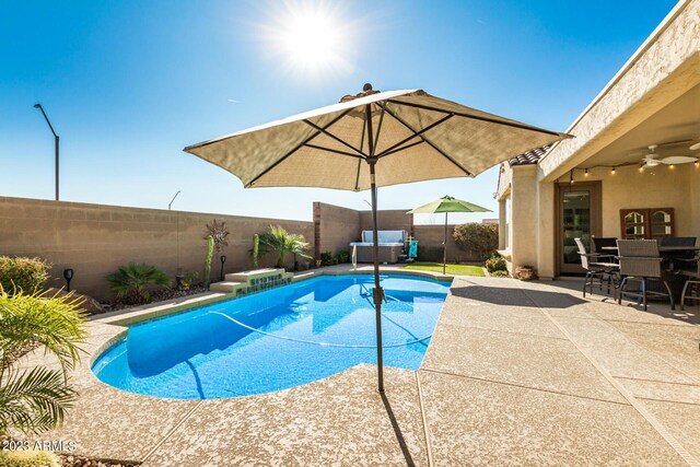 5771 W Cinder Brook Way, Florence, AZ 85132 - view of pool featuring a ceiling fan, a fenced backyard, outdoor dining space, and a patio area