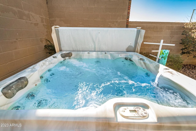 5771 W Cinder Brook Way, Florence, AZ 85132 - exterior view of a jacuzzi and fence