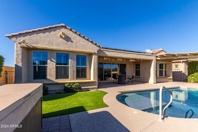 5771 W Cinder Brook Way, Florence, AZ 85132 - rear view of house featuring a patio area, stucco siding, a tile roof, and fence