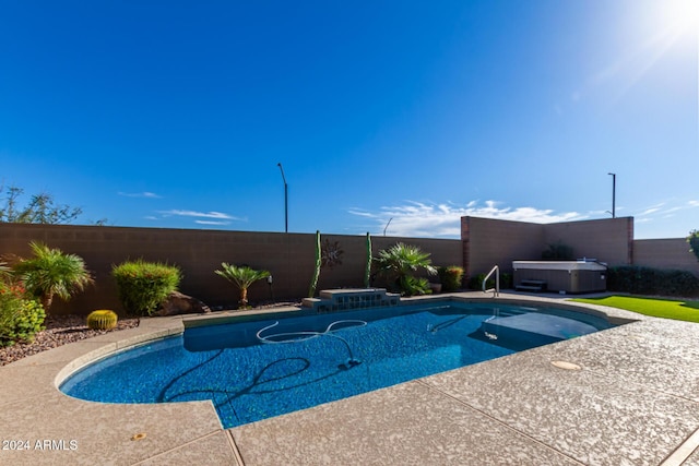 5771 W Cinder Brook Way, Florence, AZ 85132 - view of swimming pool featuring a hot tub, a fenced backyard, and a patio