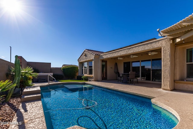 5771 W Cinder Brook Way, Florence, AZ 85132 - view of swimming pool featuring a patio and ceiling fan
