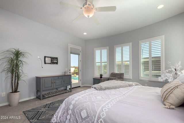 5771 W Cinder Brook Way, Florence, AZ 85132 - bedroom with carpet flooring, access to exterior, multiple windows, baseboards, and recessed lighting