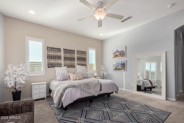 5771 W Cinder Brook Way, Florence, AZ 85132 - carpeted bedroom featuring multiple windows, baseboards, a ceiling fan, and recessed lighting