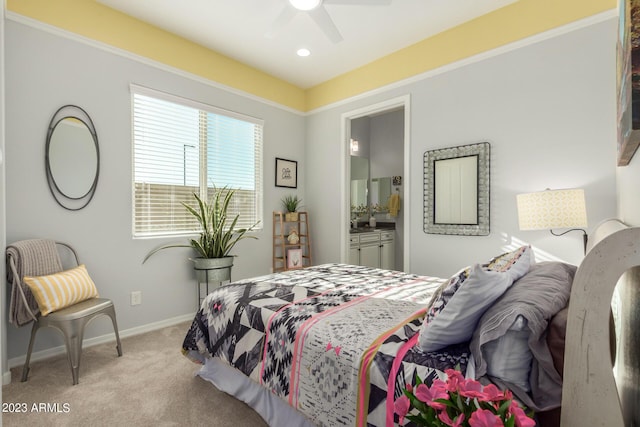 5771 W Cinder Brook Way, Florence, AZ 85132 - bedroom featuring light carpet, baseboards, connected bathroom, a ceiling fan, and recessed lighting