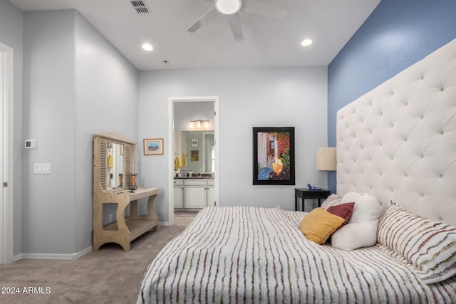 5771 W Cinder Brook Way, Florence, AZ 85132 - bedroom with light carpet, ensuite bathroom, baseboards, recessed lighting, and a ceiling fan