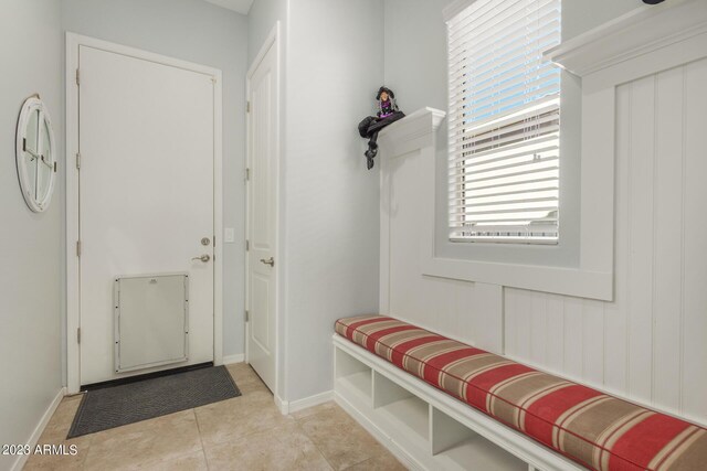 5771 W Cinder Brook Way, Florence, AZ 85132 - mudroom with light tile patterned floors and baseboards