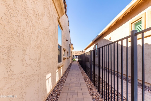 5771 W Cinder Brook Way, Florence, AZ 85132 - view of side of property featuring fence and stucco siding